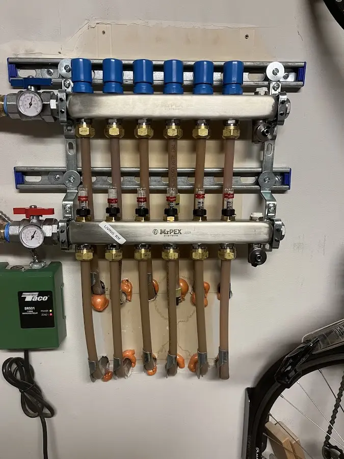 Plumber performing Water Heater Repair at a residential property in Readington